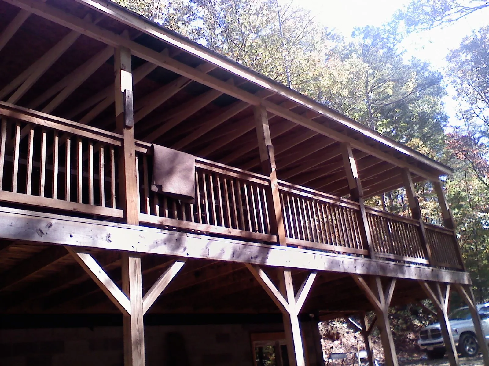 Timber framing under a new elevated porch and deck — Roof Leak Repair in Putnamville by Roofing Brothers